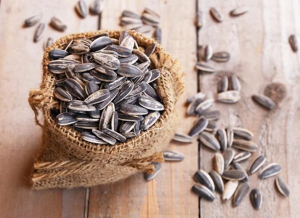 Sack with sunflower seeds — Stock Photo, Image