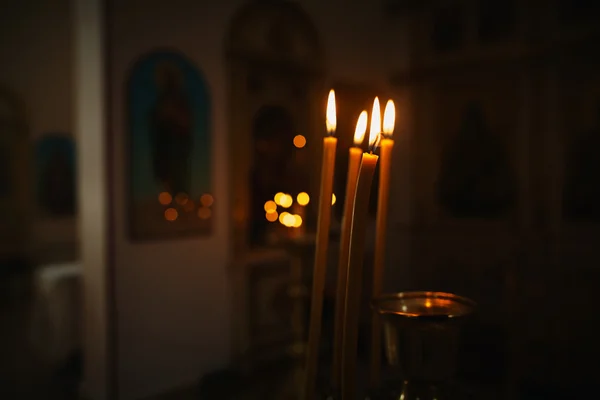 Burning candles in church — Stock Photo, Image