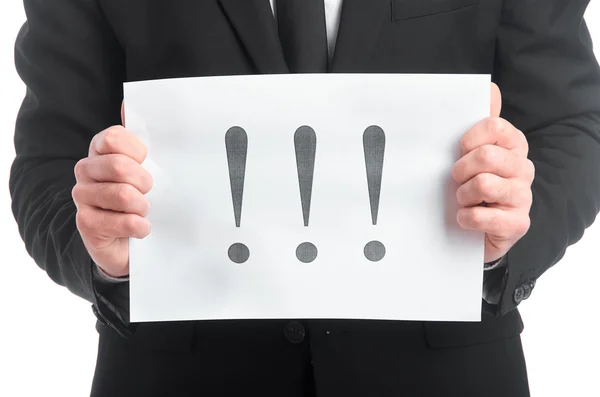 Tablet üzerindeki içinde ünlem işareti ile eller mans