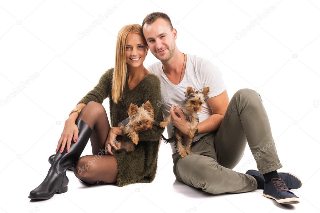 Couple with two yorkshire terriers