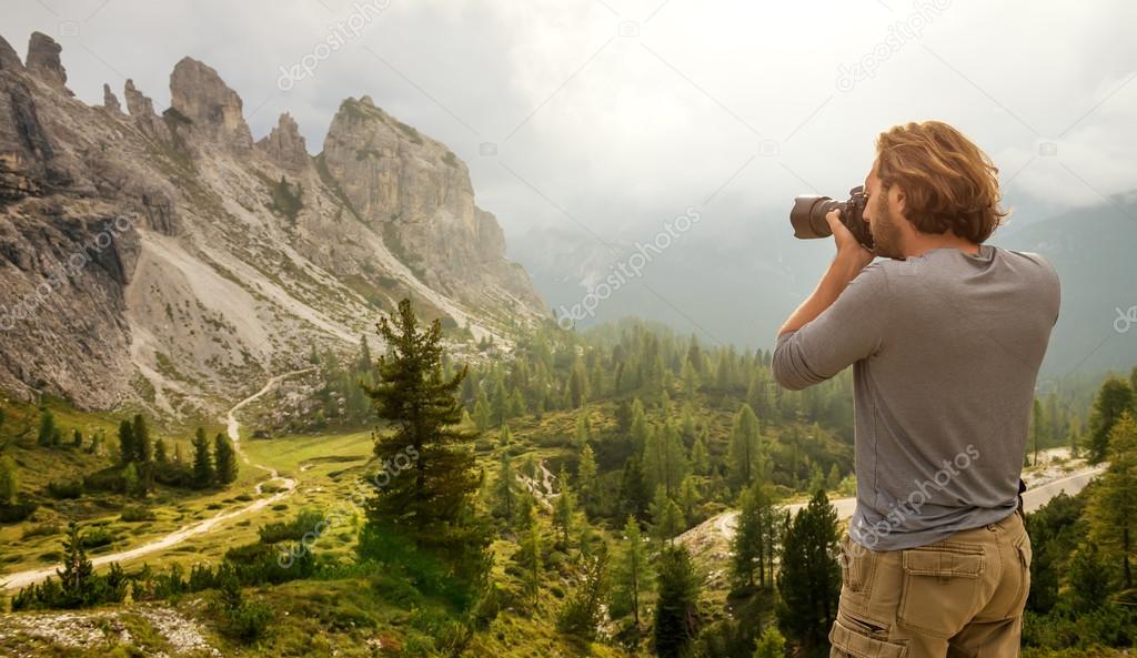 Man hiking Photographer take picture