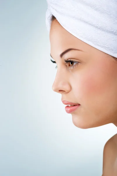 Woman with head towel on her head — Stock Photo, Image