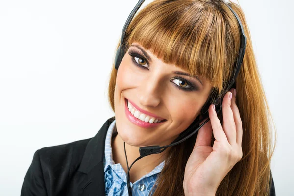 Mulher atraente com fone de ouvido — Fotografia de Stock