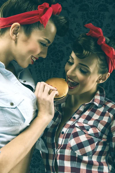 Vintage girlfriends feed of another girl — Stock Photo, Image