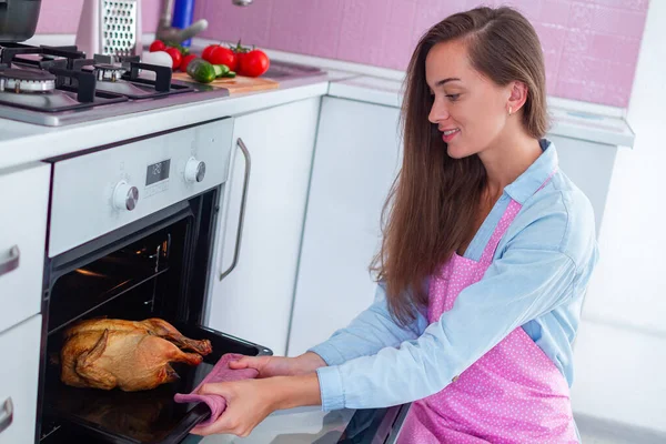 Happy Cooking Woman Apron Baking Whole Chicken Oven Dinner — Stock Photo, Image