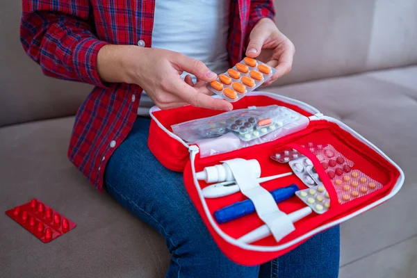 Medical first aid kit with medicine and pills