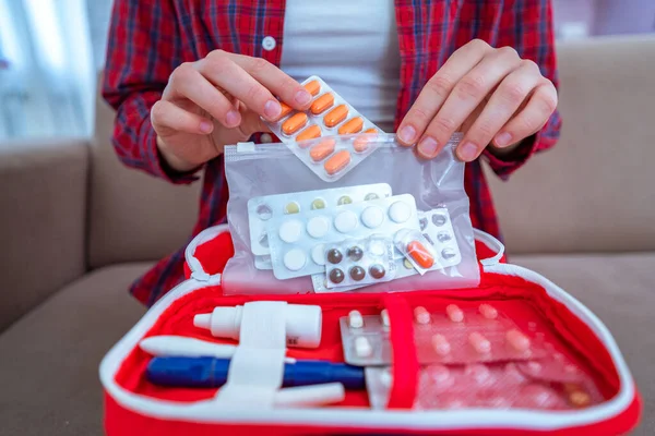 Medical first aid kit with medicine and pills for pain and illness