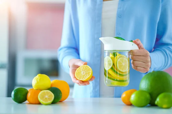 Woman Holds Glass Jug Refreshing Infused Detoxification Citrus Water Vitamin — Foto de Stock