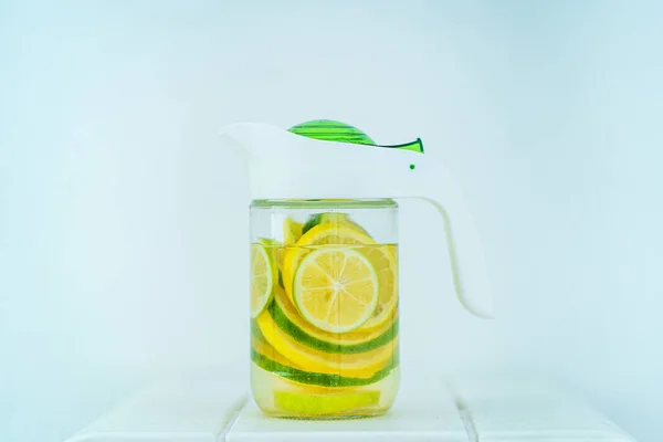 Jug Refreshing Infused Detoxification Citrus Water White Background Slimming Antioxidant — Stok fotoğraf