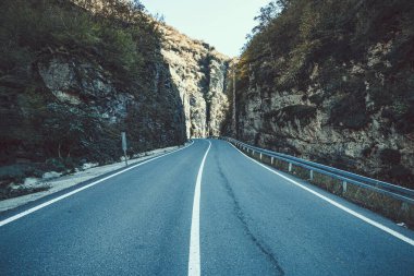 The road among the rocks in mountains 