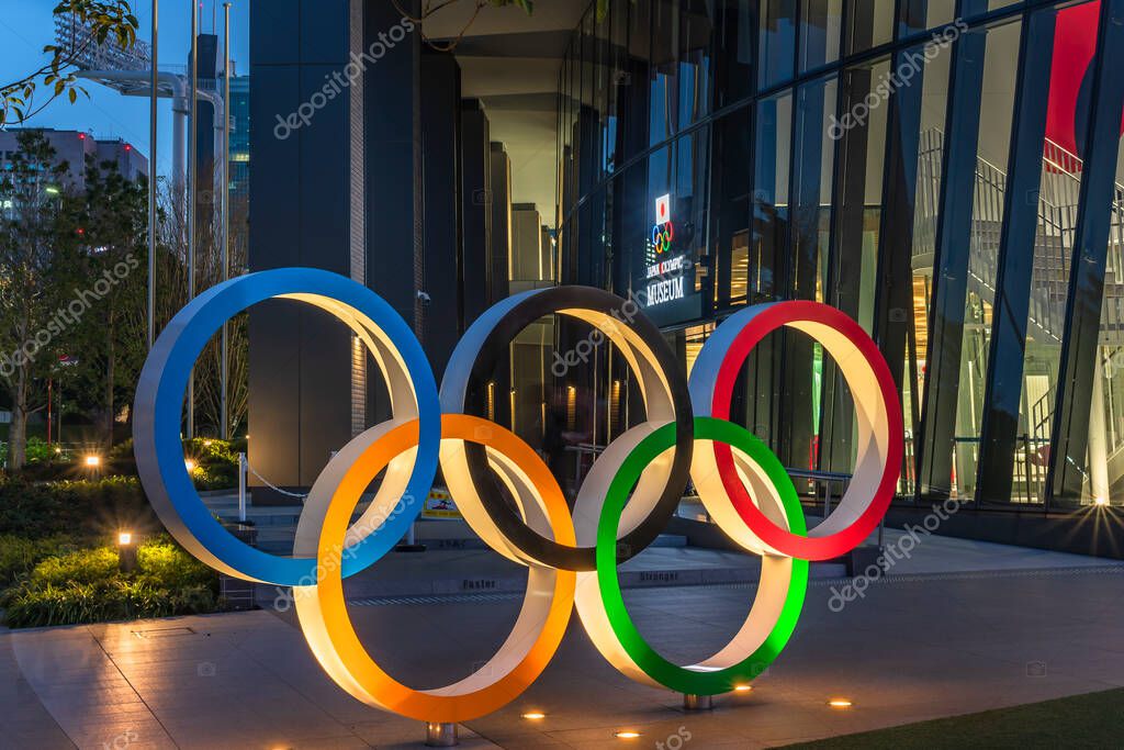 Tokyo, japan - may 05 2021: Night view of the Olympic Rings monument at the entrance of the Japan Olympic Museum created for promoting the Tokyo Olympic and Paralympic Games in 2021.