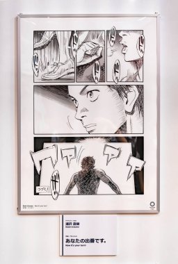 Tokyo, Japonya - 24 Ağustos 2021: Japon manga sanatçısı Naoki Urasawa 'nın Yurakucho' daki Spor Olimpiyatları Meydanı 'nda hazırladığı çizgi roman serisinin afişi.
