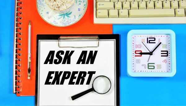 Ask an expert. Text inscription on the research notebook. Assessment for making a responsible decision or choice. Getting an answer to a question.