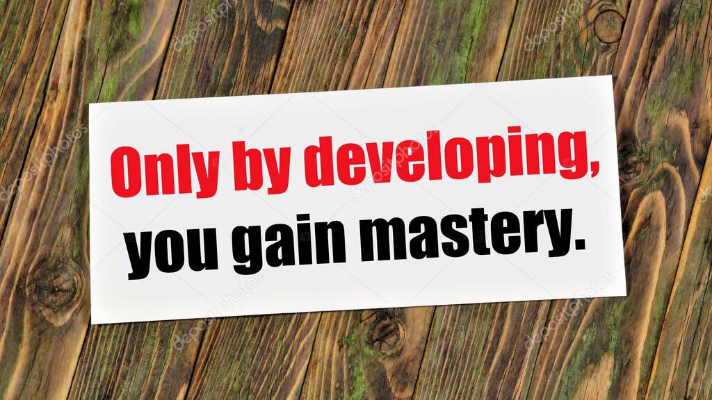 Only by developing, you gain mastery. Text inscription in the banner plate. An irreversible, natural change. Transition from the old quality to the new one. Professionalism, developed by personal experience.