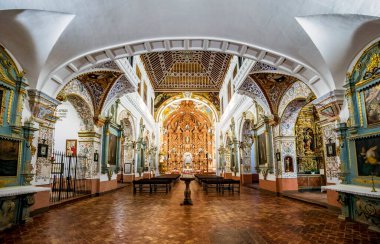 Baroque interior of the Carmen church in Antequera, Malaga, Andalusia, lavishly decorated