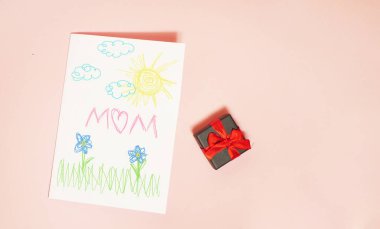 Greeting card with kids drawings flat lay. Mother day celebration 