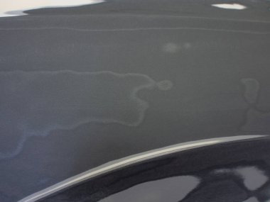 Sarı araba parçaları üzerine araba macunu..