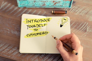 Handwritten text INTRODUCE YOURSELF TO CUSTOMERS