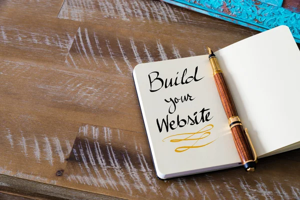 Handwritten text BUILD YOUR WEBSITE — Stok fotoğraf