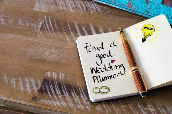 Schriftlicher Text findet einen guten Hochzeitsplaner — Stockfoto