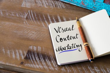 Handwritten text VISUAL CONTENT MARKETING
