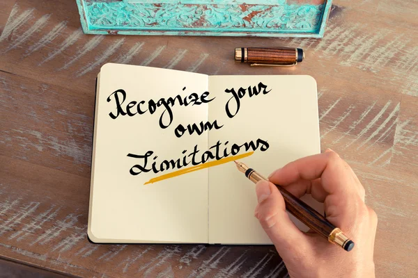 Handwritten text RECOGNIZE YOUR OWN LIMITATIONS — Stock Photo, Image