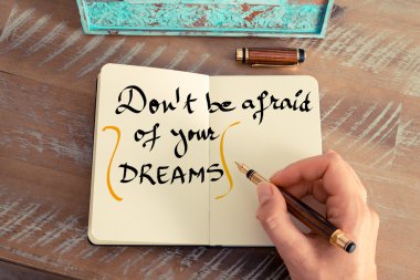 Handwritten text DON'T BE AFRAID OF YOUR DREAMS