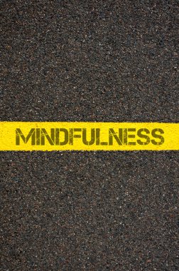 Road marking yellow line with word MINDFULNESS