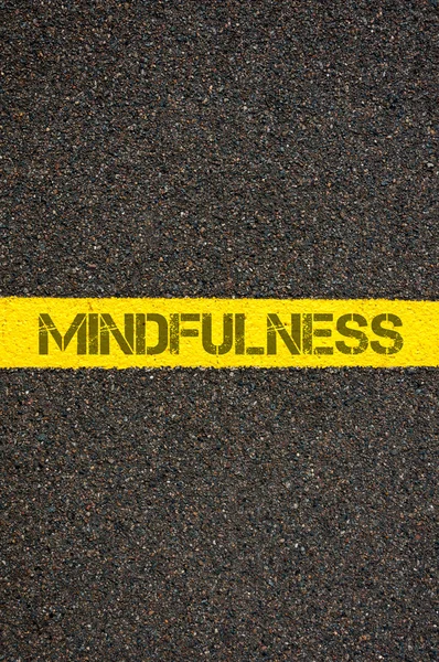 Road marking yellow line with word MINDFULNESS