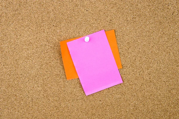 Blank paper notes pinned on cork board — Stock Photo, Image