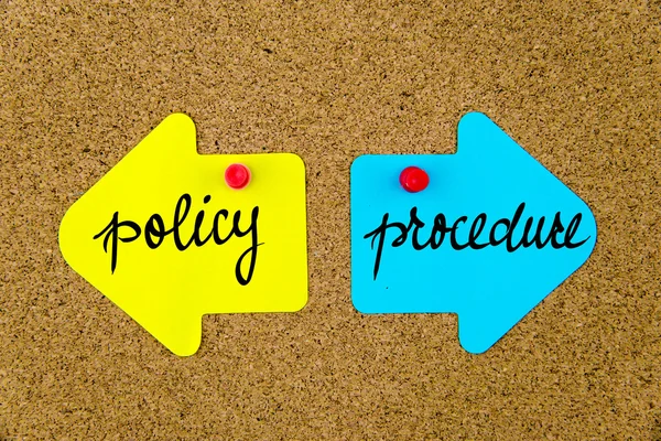 Message POLICY versus PROCEDURE  on arrow paper notes — Stock Photo, Image