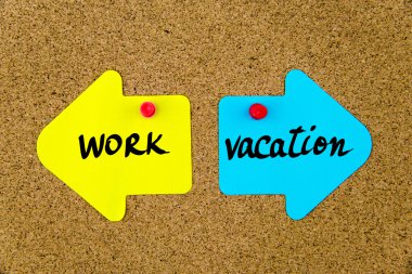 Message WORK versus VACATION on arrow paper notes