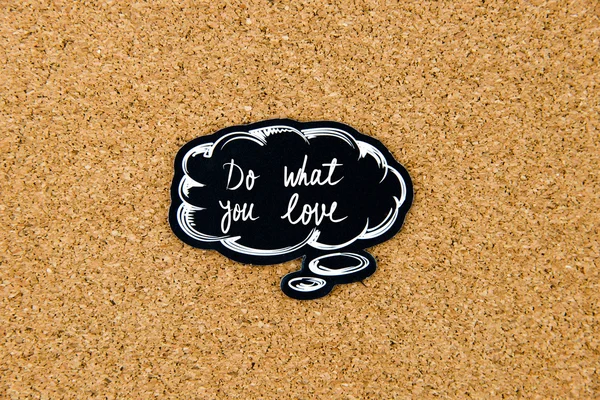 Do what YOU LOVE written on black thinking bubble — стоковое фото