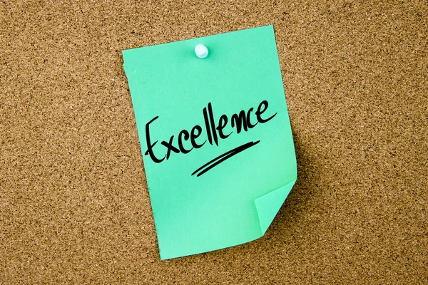 Excellence written on green paper note — Stock Photo, Image