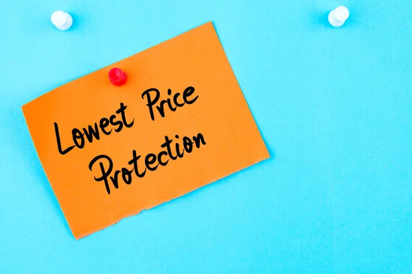 Χαμηλότερη τιμή προστασίας γραμμένο σε πορτοκαλί βιβλίο Σημείωση — Φωτογραφία Αρχείου