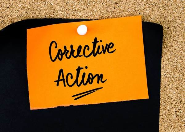 Corrective Action written on orange paper note — Stock Photo, Image