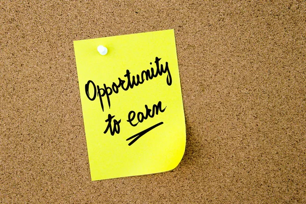 Opportunity To Earn written on yellow paper note — Stock Photo, Image