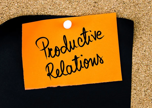Relações Produtivas escritas em papel laranja — Fotografia de Stock