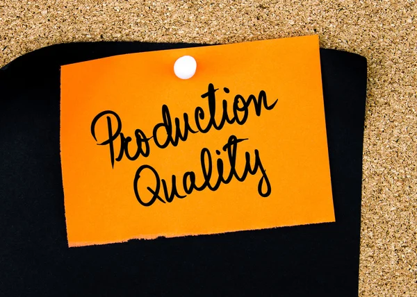 Production Quality written on orange paper note