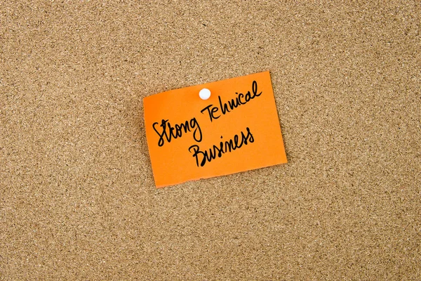 Strong Technical Business written on orange paper note — Stock Photo, Image