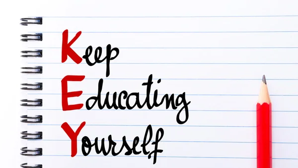 KEY Keep Educating Yourself written on notebook page — Stock Photo, Image