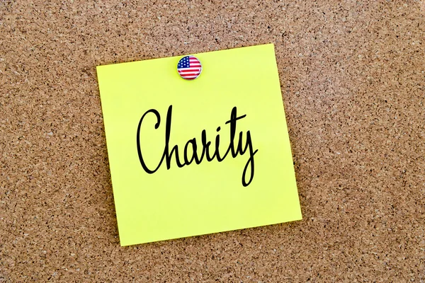 Written text Charity over yellow paper note — Stock Photo, Image