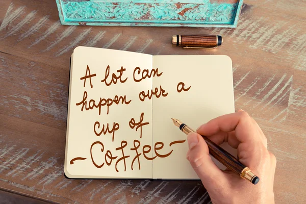 Handwritten text A Lot Can Happen Over A Cup Of Coffee — Stock Photo, Image