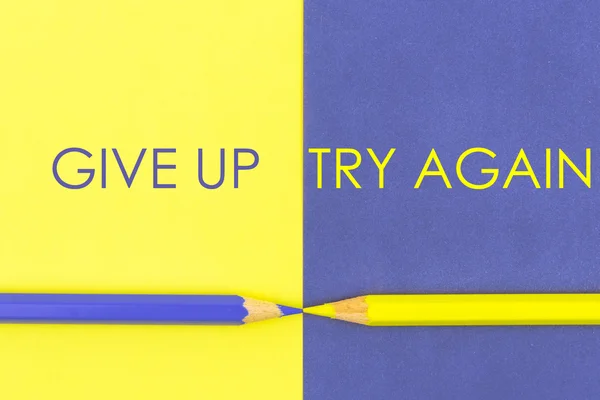 Контрастная концепция Give Up против Try Again — стоковое фото