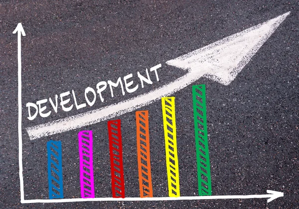 Colorful graph drawn over tarmac and directional arrow — Stock Photo, Image