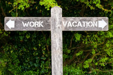 WORK versus VACATION directional signs