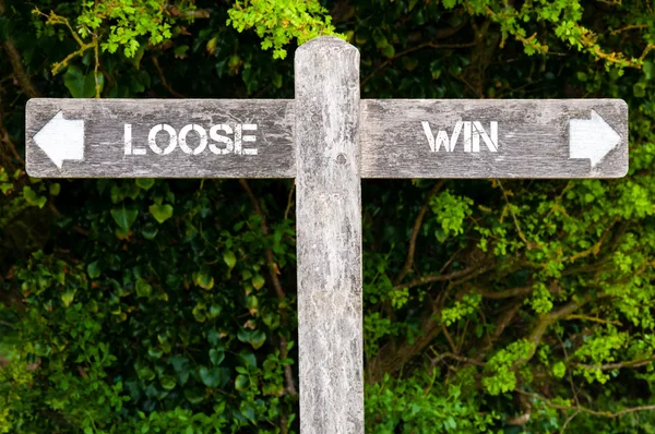 Lös kontra Win skyltar — Stockfoto