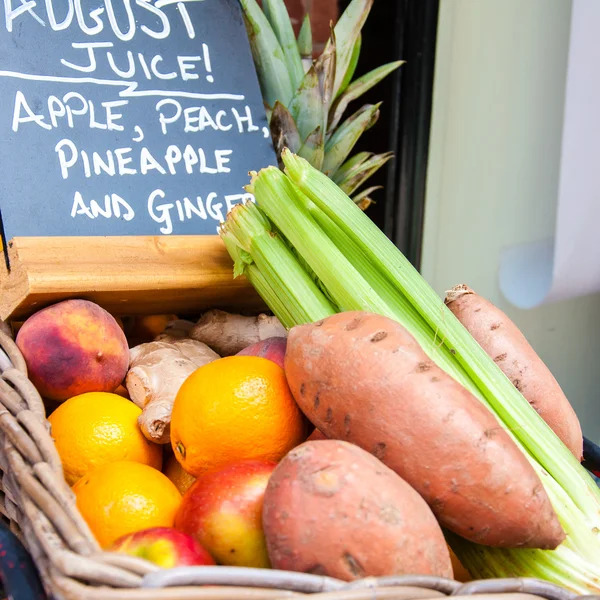 Fresh vegetables and fruits in a basket for juice