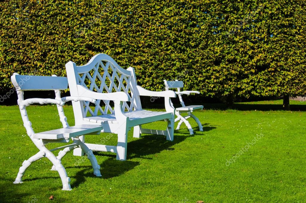 White Wooden Bench And Chairs In Countryside English Park Stock
