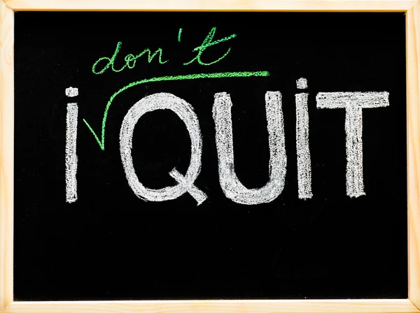 I don't quit message, handwriting with chalk on wooden frame blackboard, lifestyle change concept — Stock Photo, Image